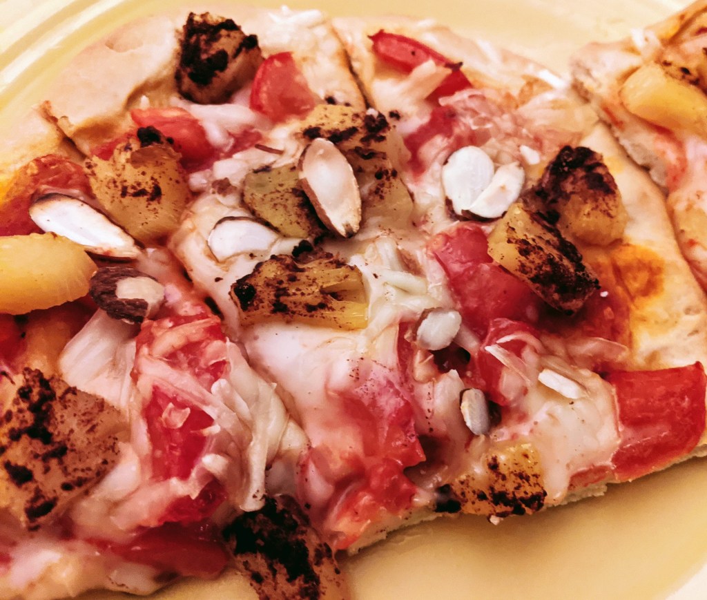 Close up of vegan Hawaiian pizza toppings