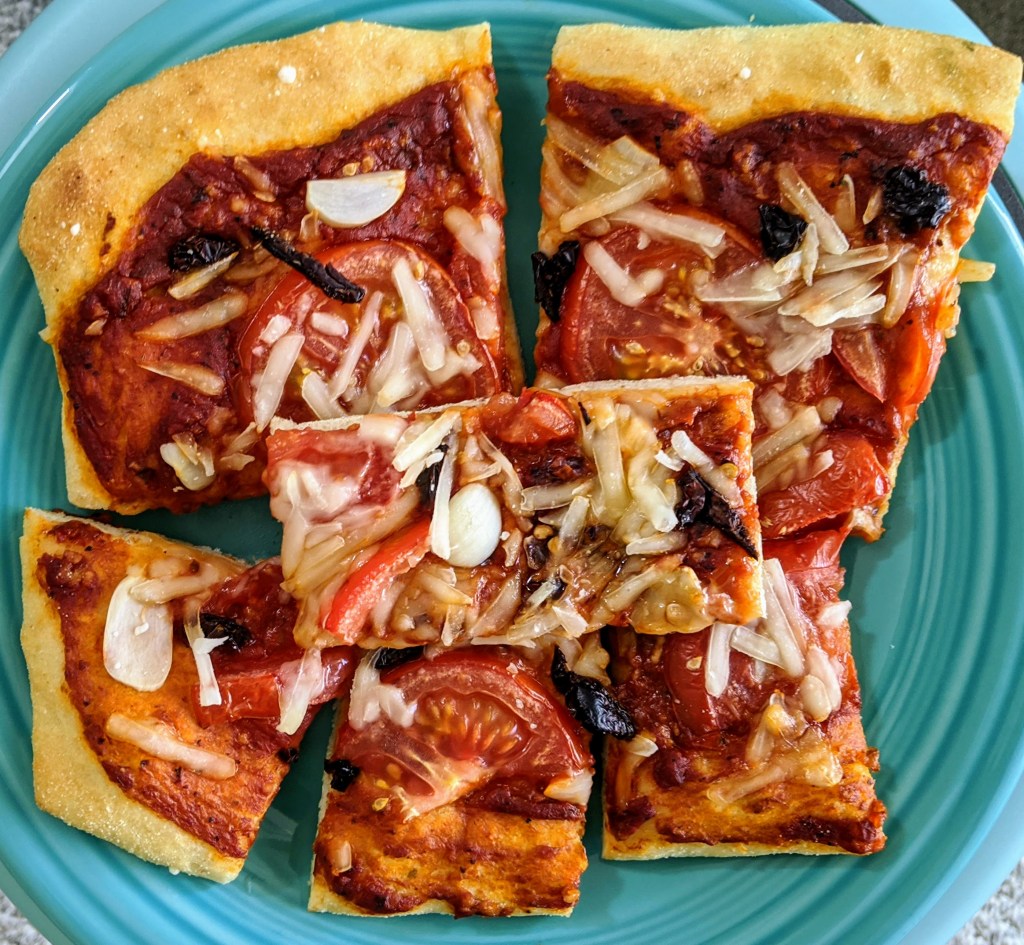 blue plate of spicy Il Diavolo pizza